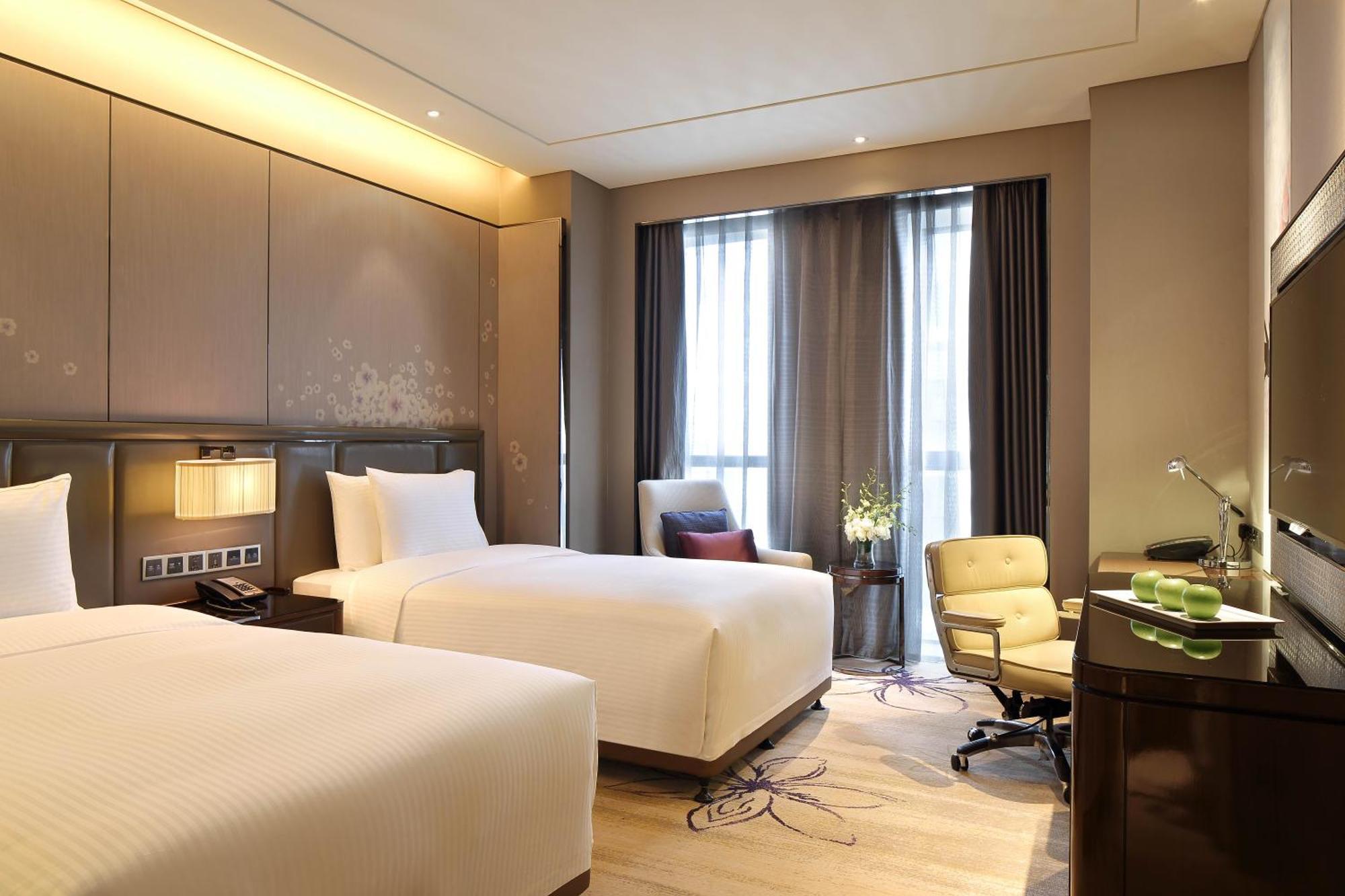 Hotel Wanda Realm Guangyuan Esterno foto