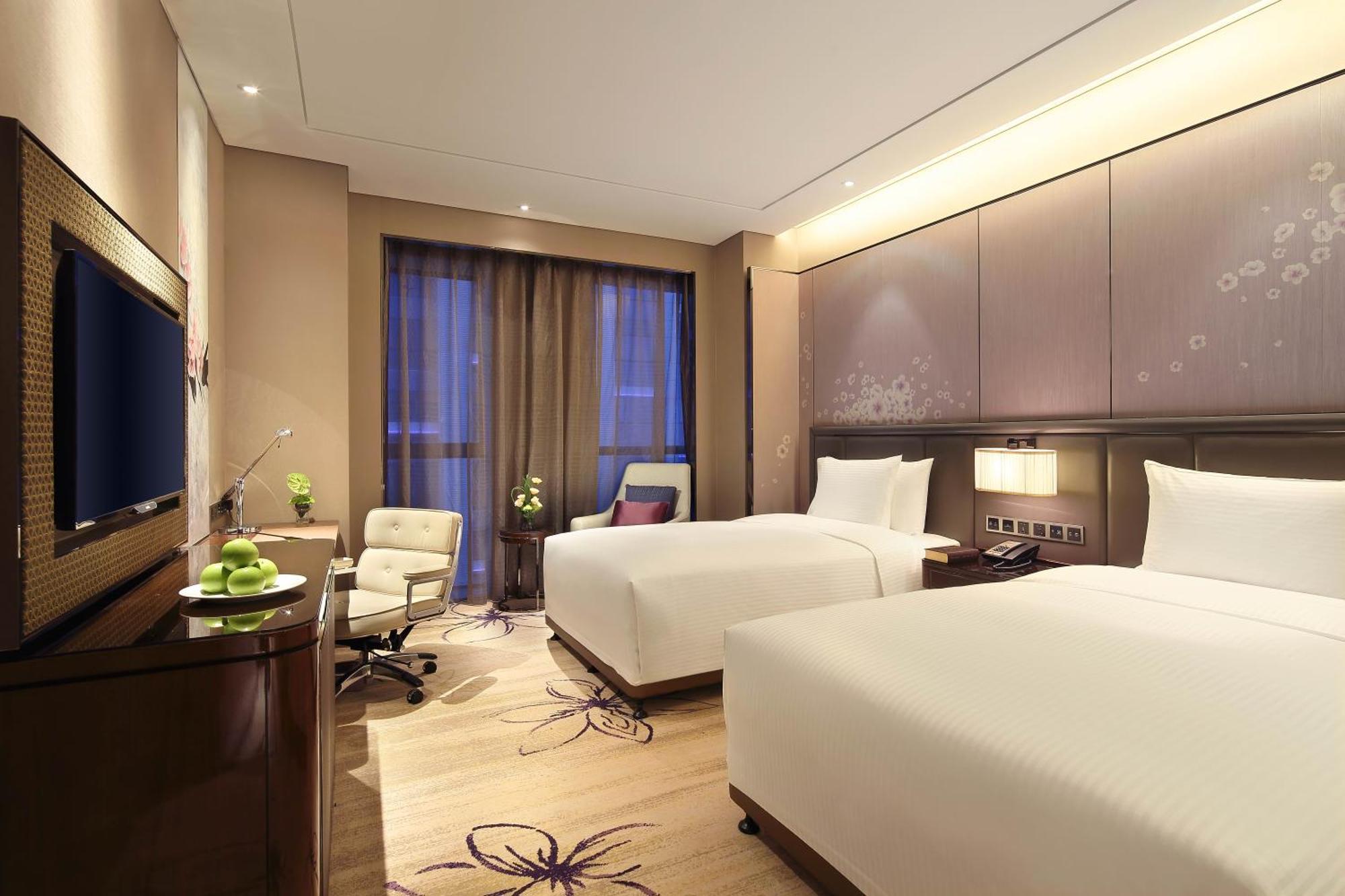Hotel Wanda Realm Guangyuan Esterno foto